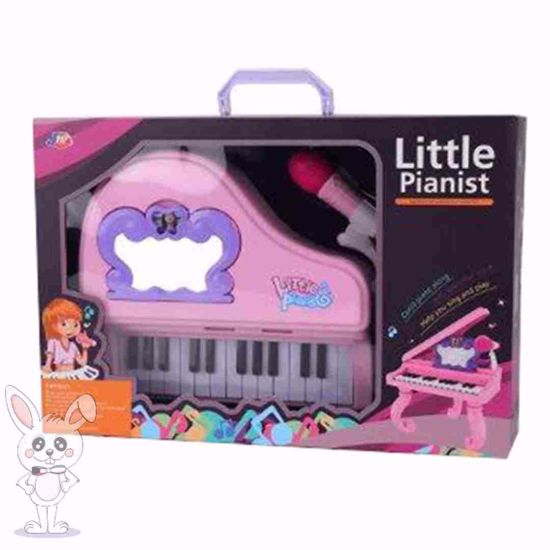 صورة بيانو وردي مع ذيل وميكروفون