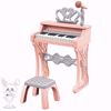صورة بيانو مع كرسي وميكروفون